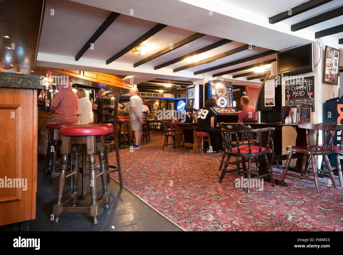 Inside Of A Pub With Subject Movement Blur Stock Photo