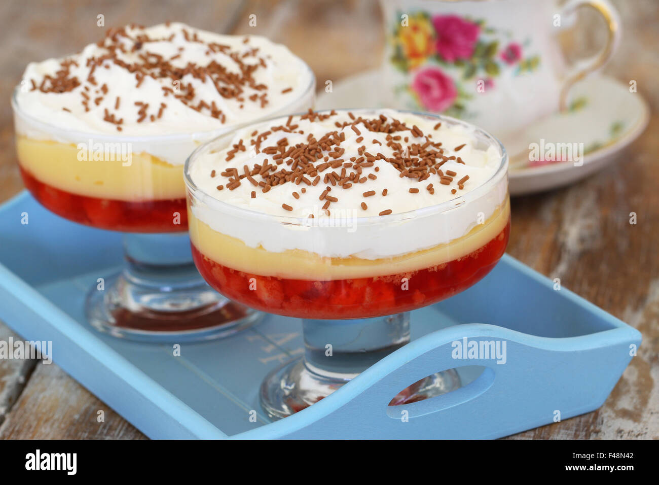 Traditional strawberry trifle dessert with fresh whipped cream and