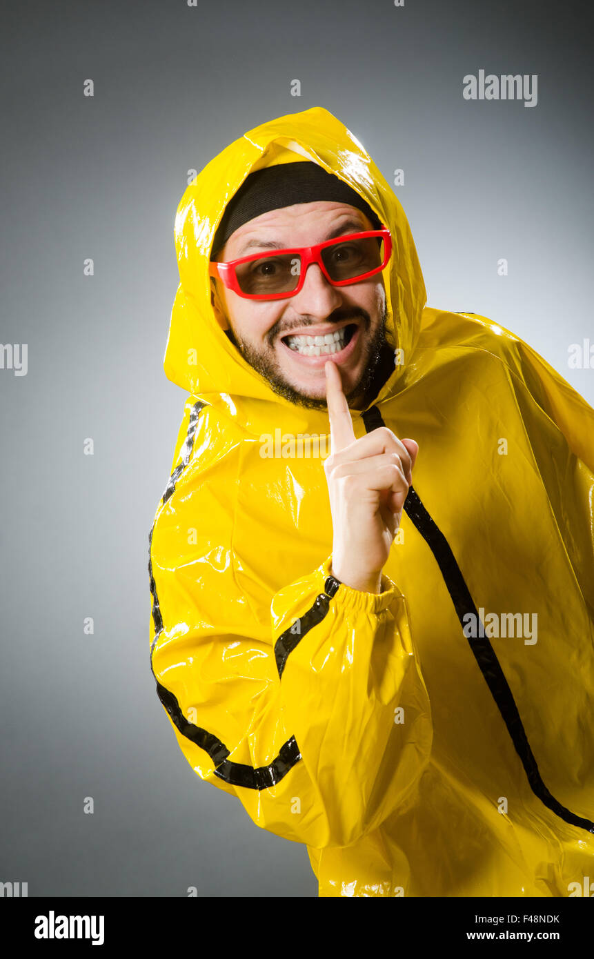 Funny man wearing yellow suit Stock Photo Alamy