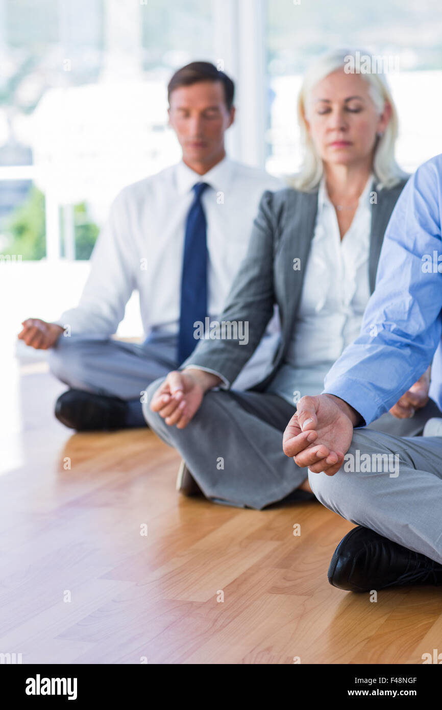 Business people doing yoga hi-res stock photography and images - Alamy