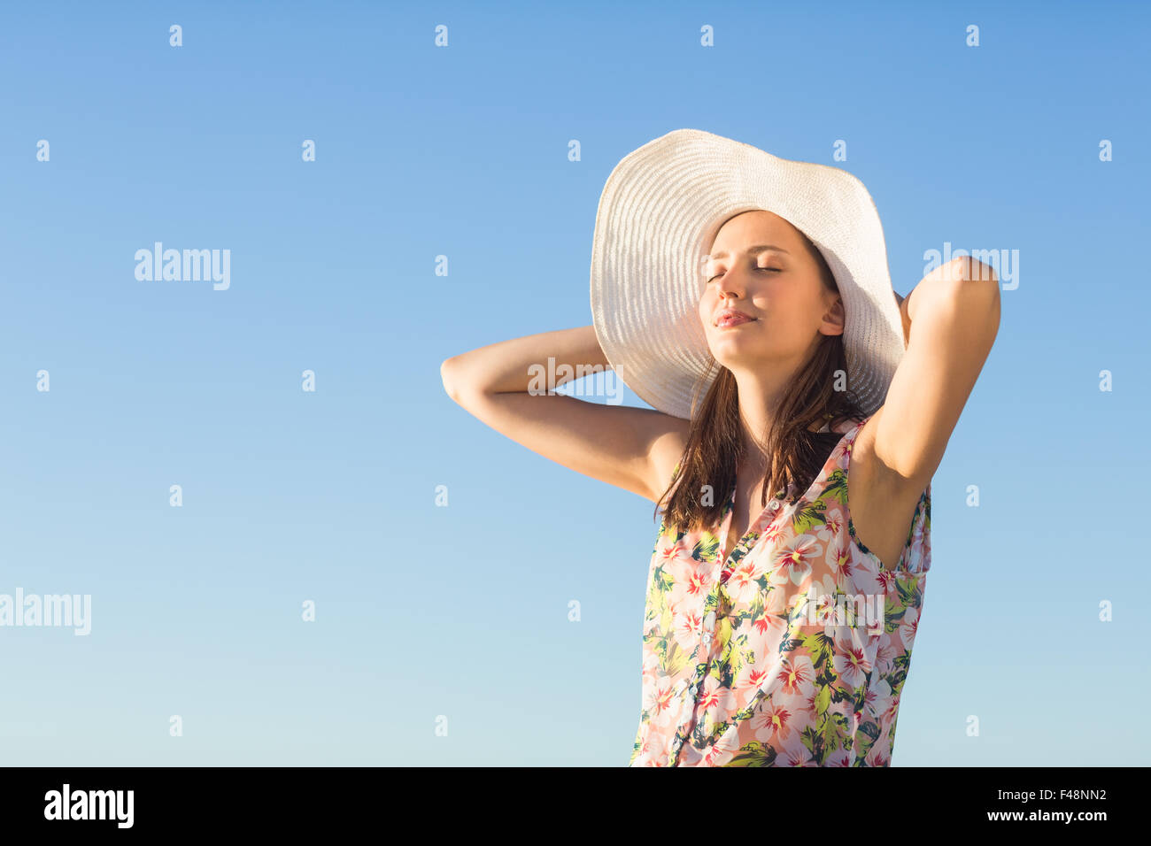 Wearing straw hat hi-res stock photography and images - Alamy