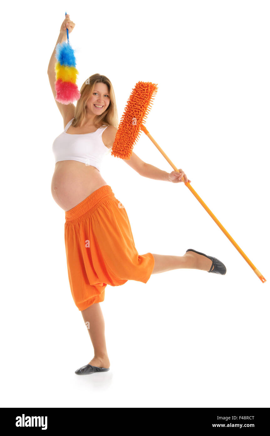 happy pregnant woman with a mop and brush Stock Photo Alamy