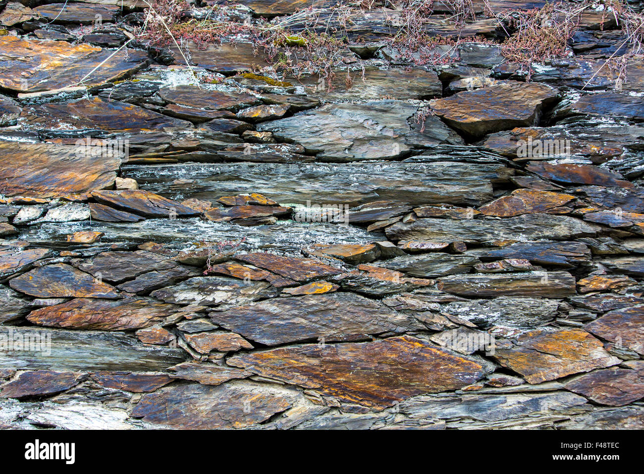 Brick stone wall, made of slate stones, in a vineyard near Bacharach
