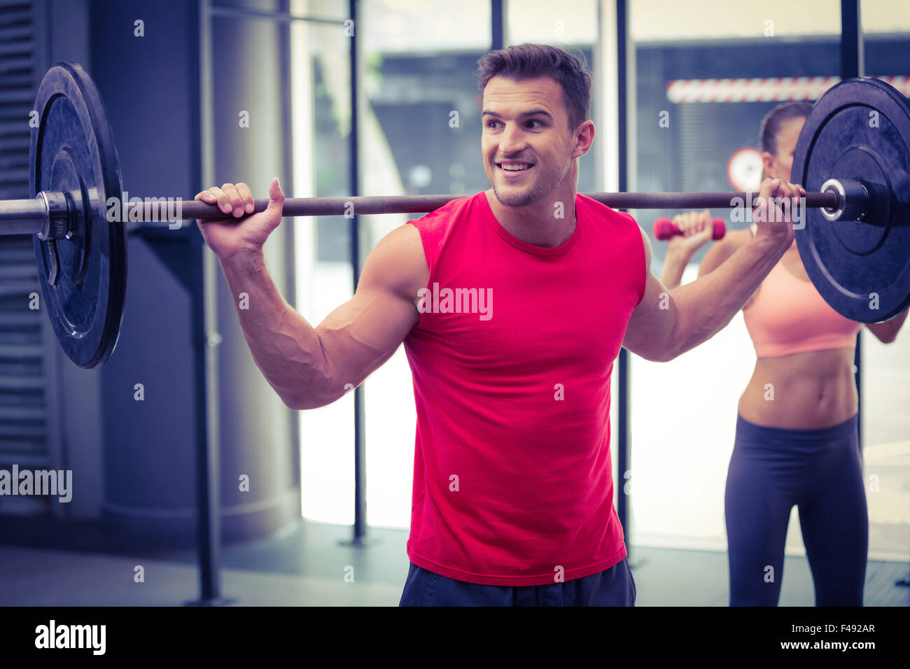Two young Bodybuilders doing weightlifting Stock Photo