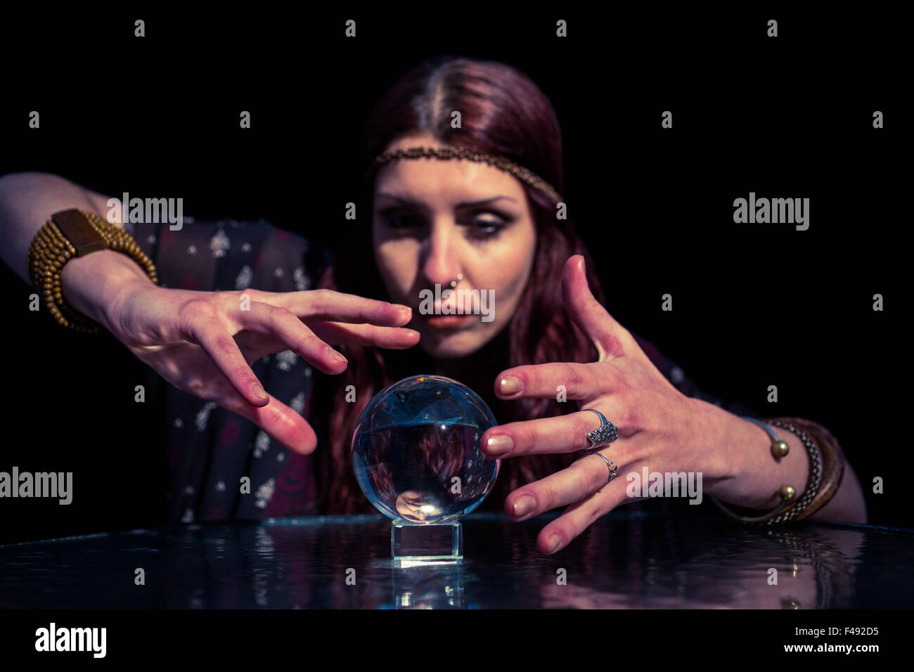 Fortune teller using crystal ball Stock Photo Alamy Fortune teller using crystal ball Stock Photo Alamy
