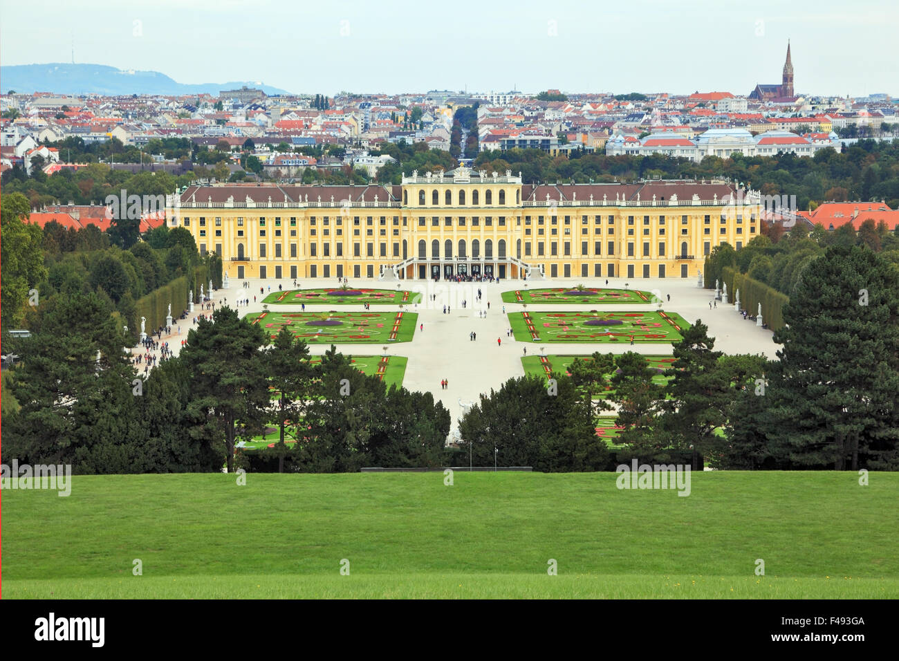 Palace and flower beds in the spacious area Stock Photo