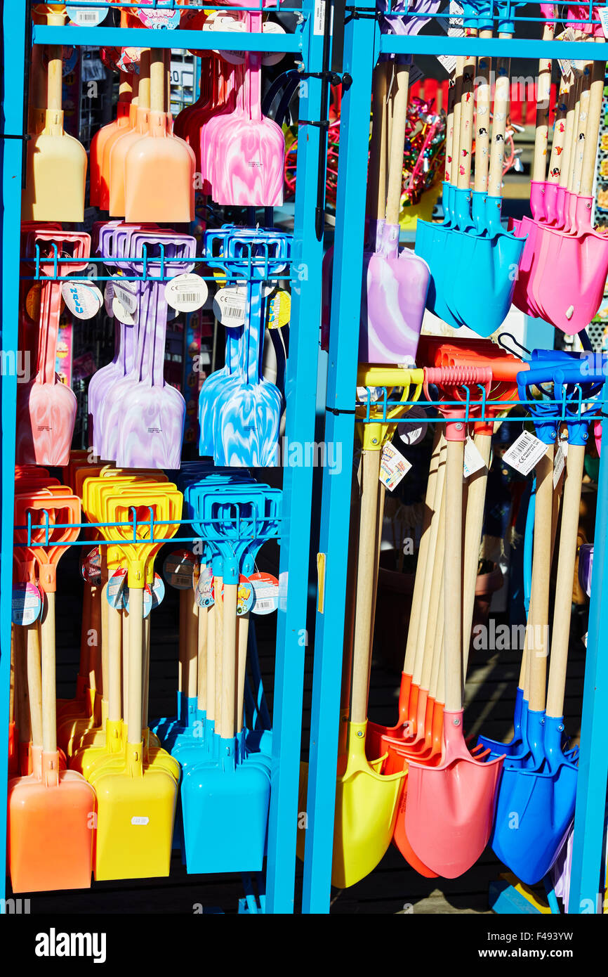 Display of colorful beach spades at Skegness, Lincolnshire, England, UK Stock Photo Alamy