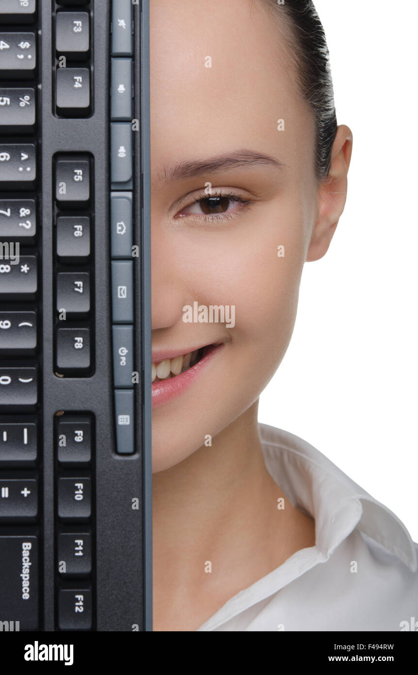 Smiling female face covered keyboard Stock Photo Alamy