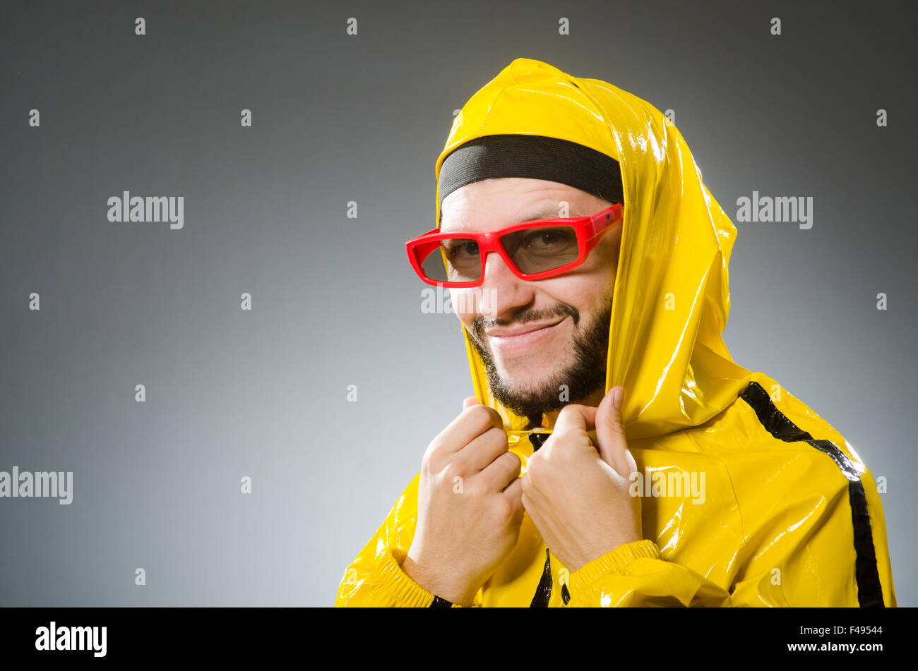 Funny man wearing yellow suit Stock Photo Alamy