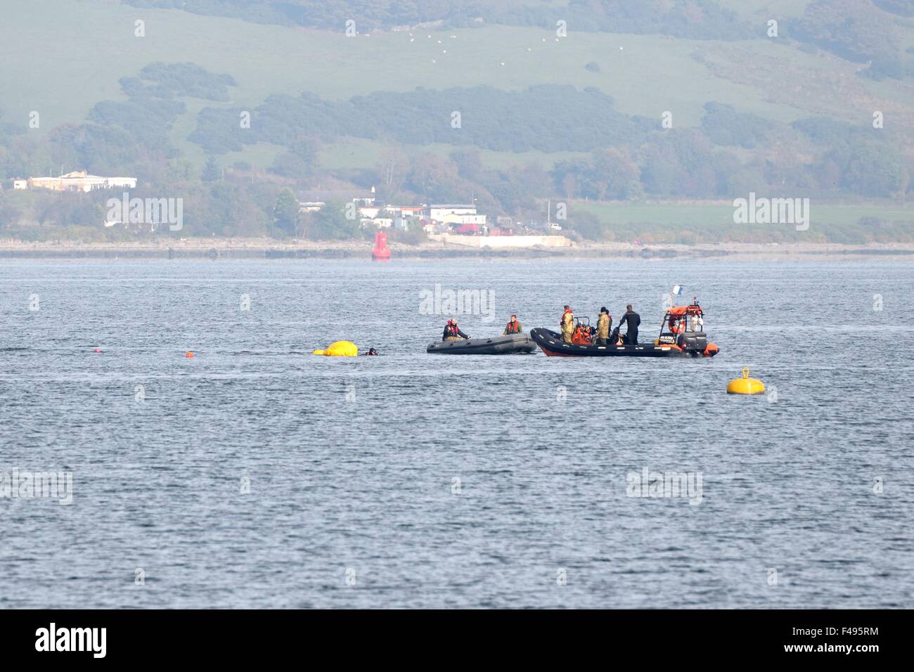 River Clyde, Gourock, Scotland, UK. 15th October 2015. Royal Navy bomb disposal unit detonates wartime mine. The Royal Navy bomb disposal unit towed the world war 2 mine, which was found close to the Gourock shoreline, to safety before divers set an explosive charge to destroy and render the mine safe. Alamy Live News Stock Photo
