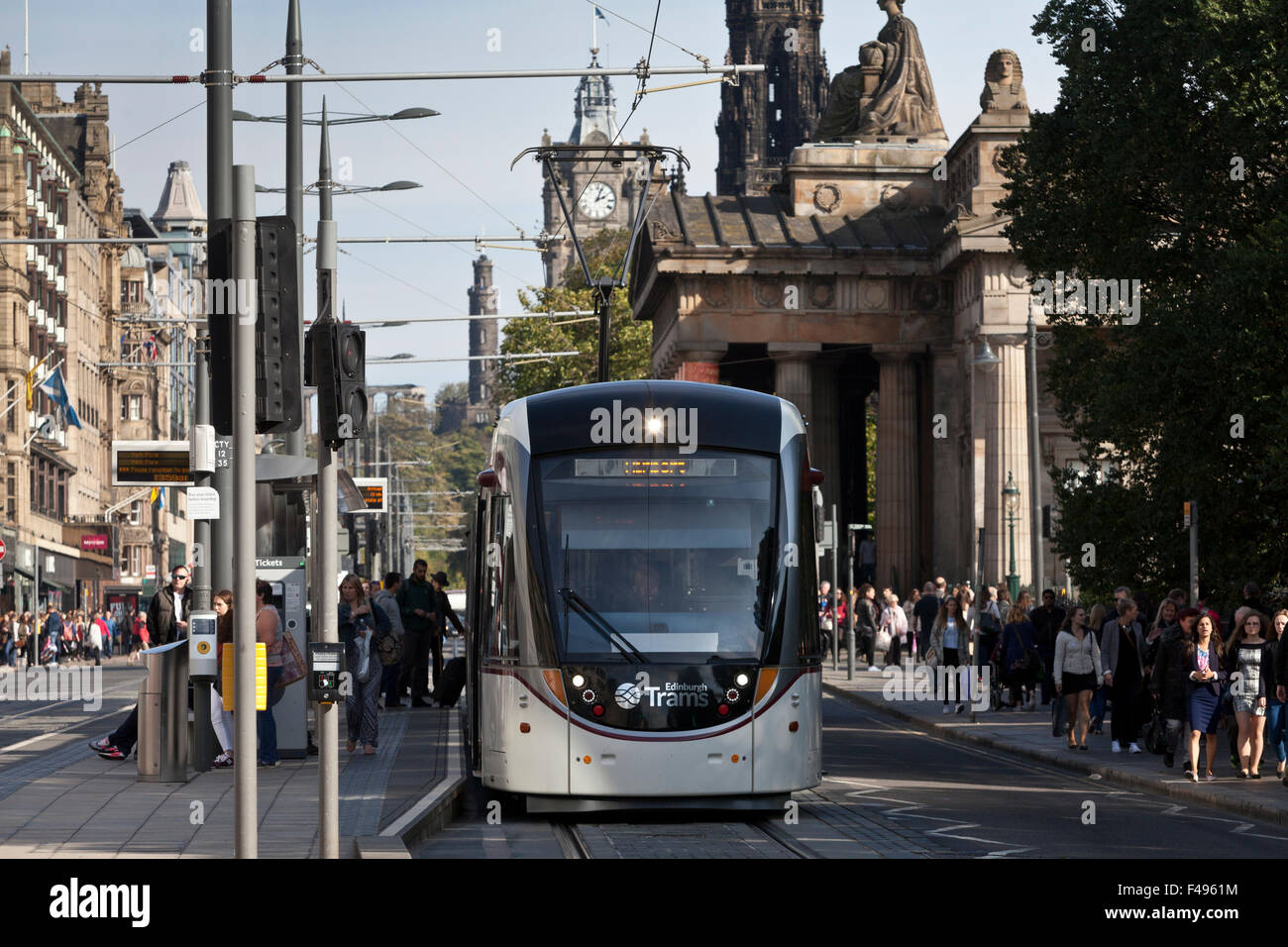 Edinburgh tram on Princes Street, with National Gallery and the Scott Monument in background. Edinburgh, Scotland. Stock Photo
