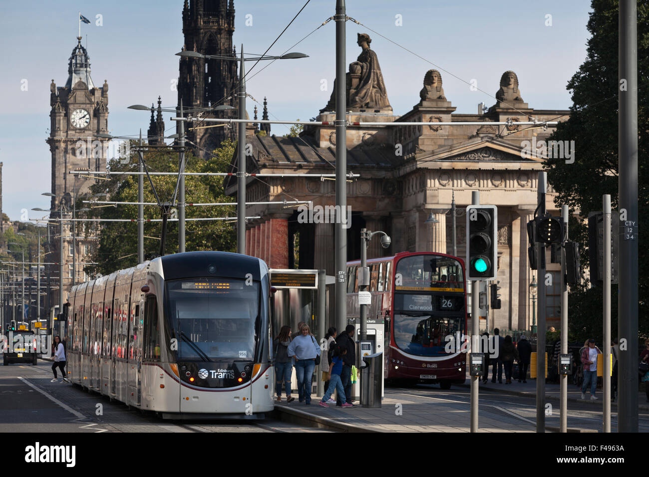 Edinburgh tram on Princes Street, with National Gallery and the Scott Monument in background. Edinburgh, Scotland. Stock Photo