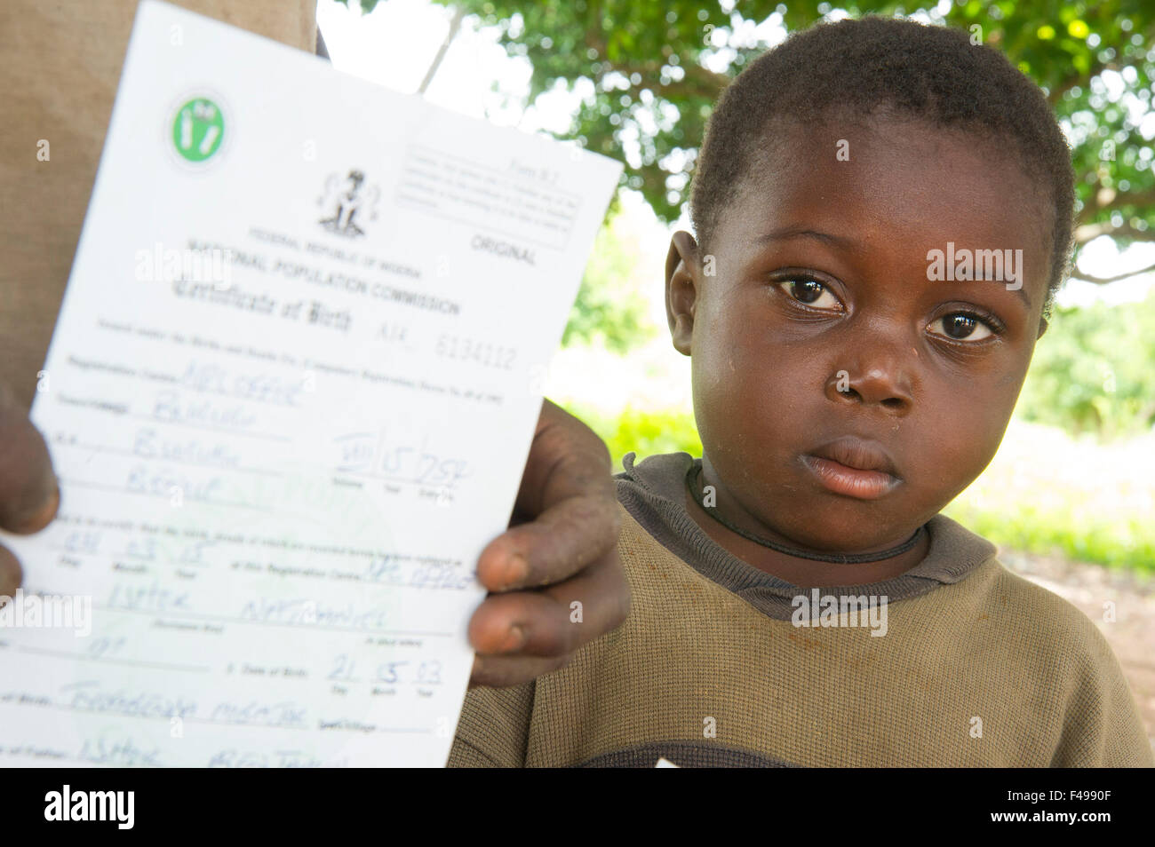 Buruku Local Government Area, Benue, Nigeria. 4th Sep, 2015. September 4, 2015, Buruku, Nigeria - Young brothers display the birth certificates they were issued after being identified as vulnerable through Catholic Relief Services' partner agency Caritas as part of the SMILE program (Sustainable Mechanisms for Improving Livelihoods and Household Empowerment). CRS is training local volunteers to identify and register vulnerable children in this and other nearby communities so they can be issued with legal birth certificates. © David Snyder/ZUMA Wire/Alamy Live News Stock Photo