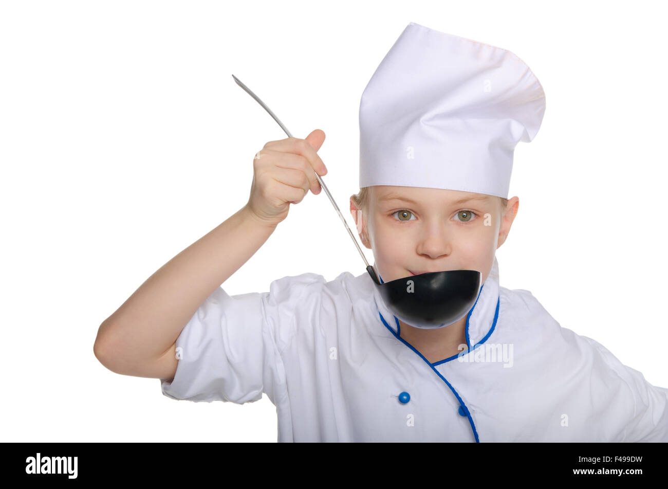 Young chef tasting food Stock Photo - Alamy