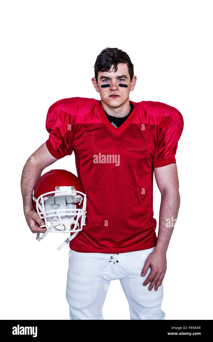 American football player holding helmet Stock Photo Alamy