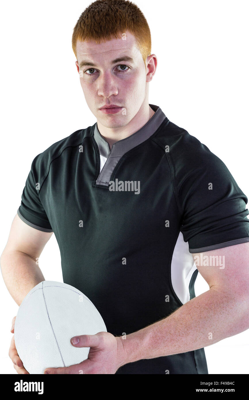 Rugby player holding a rugby ball Stock Photo Alamy