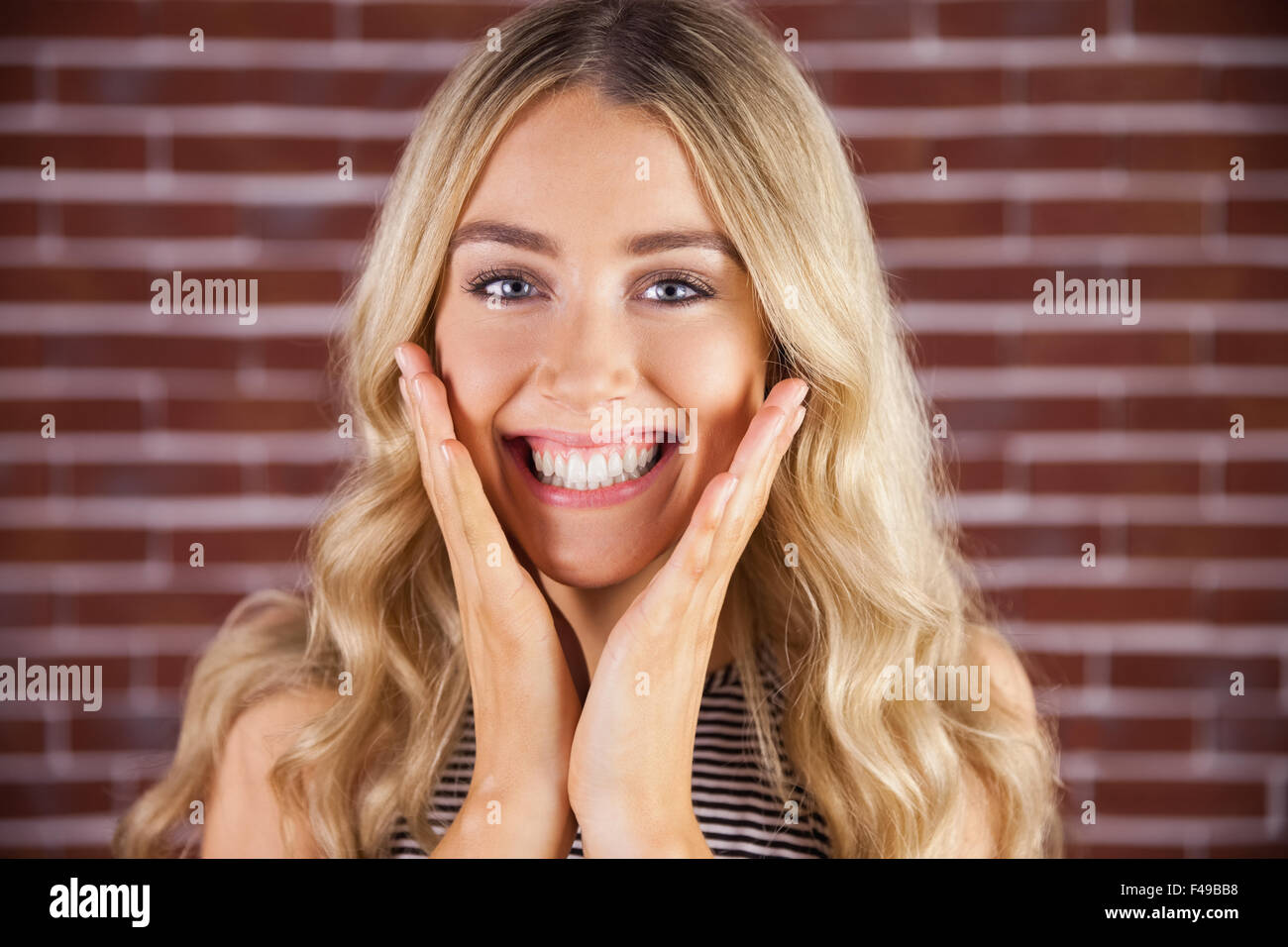 Beautiful blonde woman being glad Stock Photo
