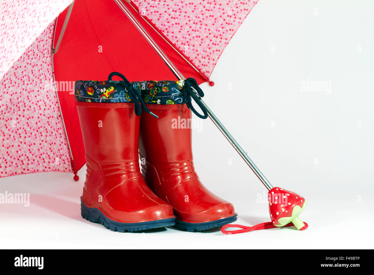 Umbrella and boots for the rain Stock Photo - Alamy