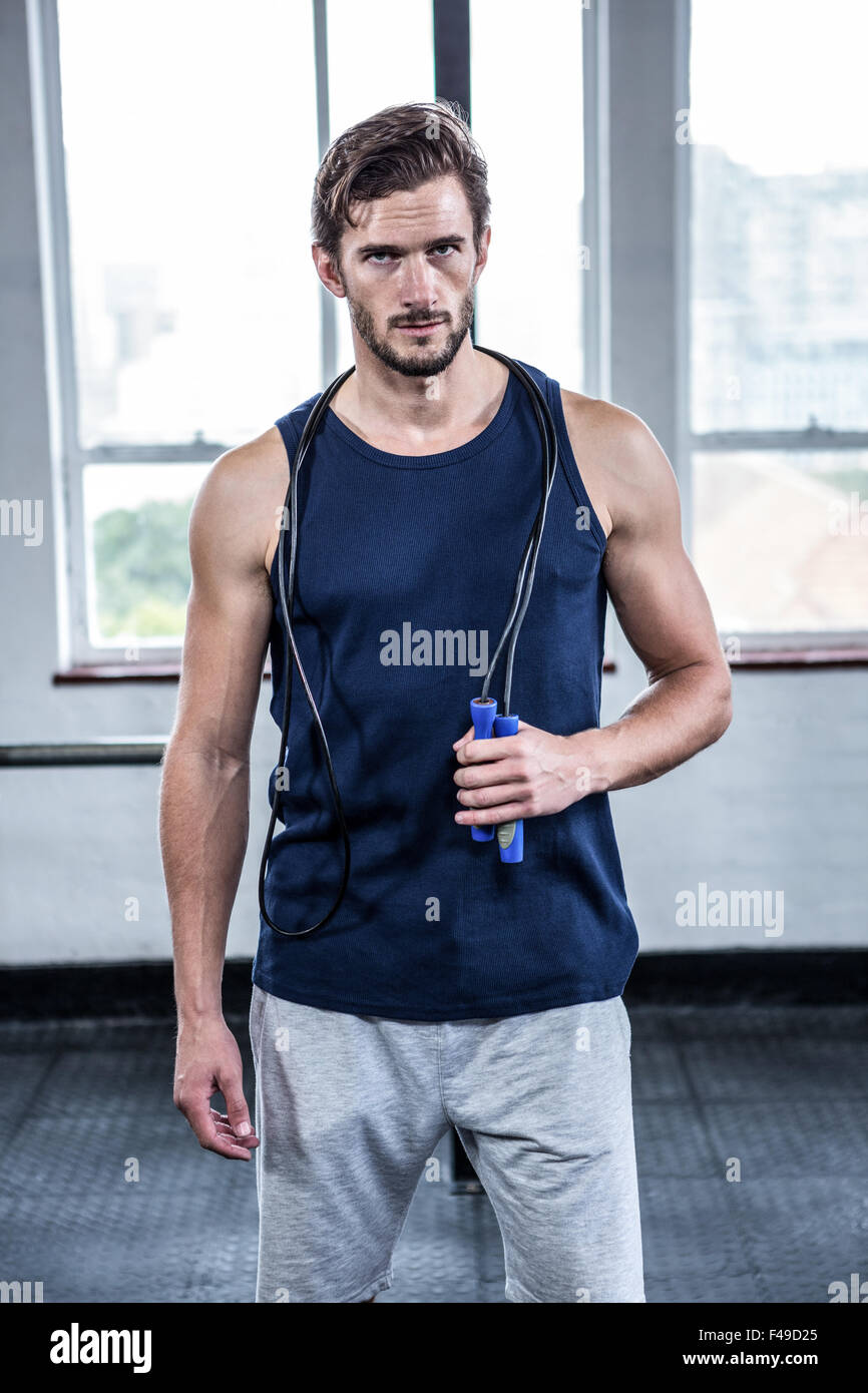 Fit man with skipping rope Stock Photo