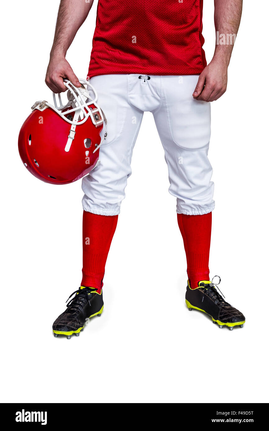American football player holding a helmet Stock Photo Alamy
