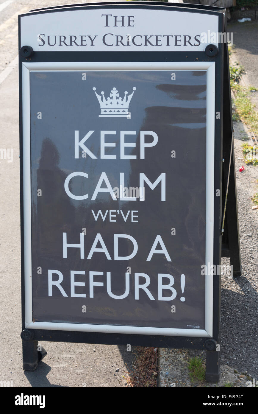 'Keep calm we've had a refurb' sign, The Surrey Cricketers Pub, Chertsey Road, Windlesham, Surrey, England, United Kingdom Stock Photo
