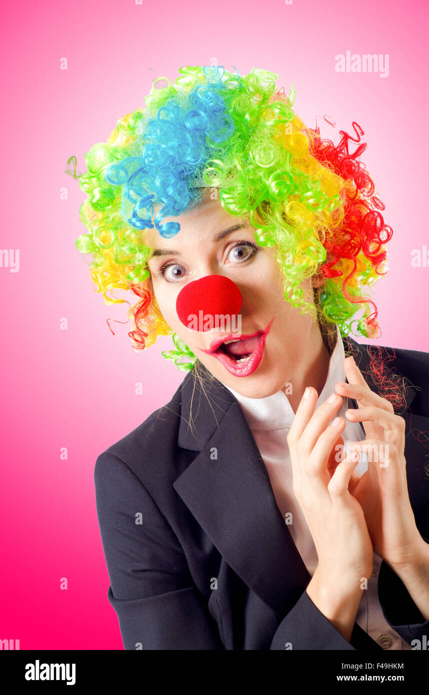 Woman clown in business suit Stock Photo - Alamy