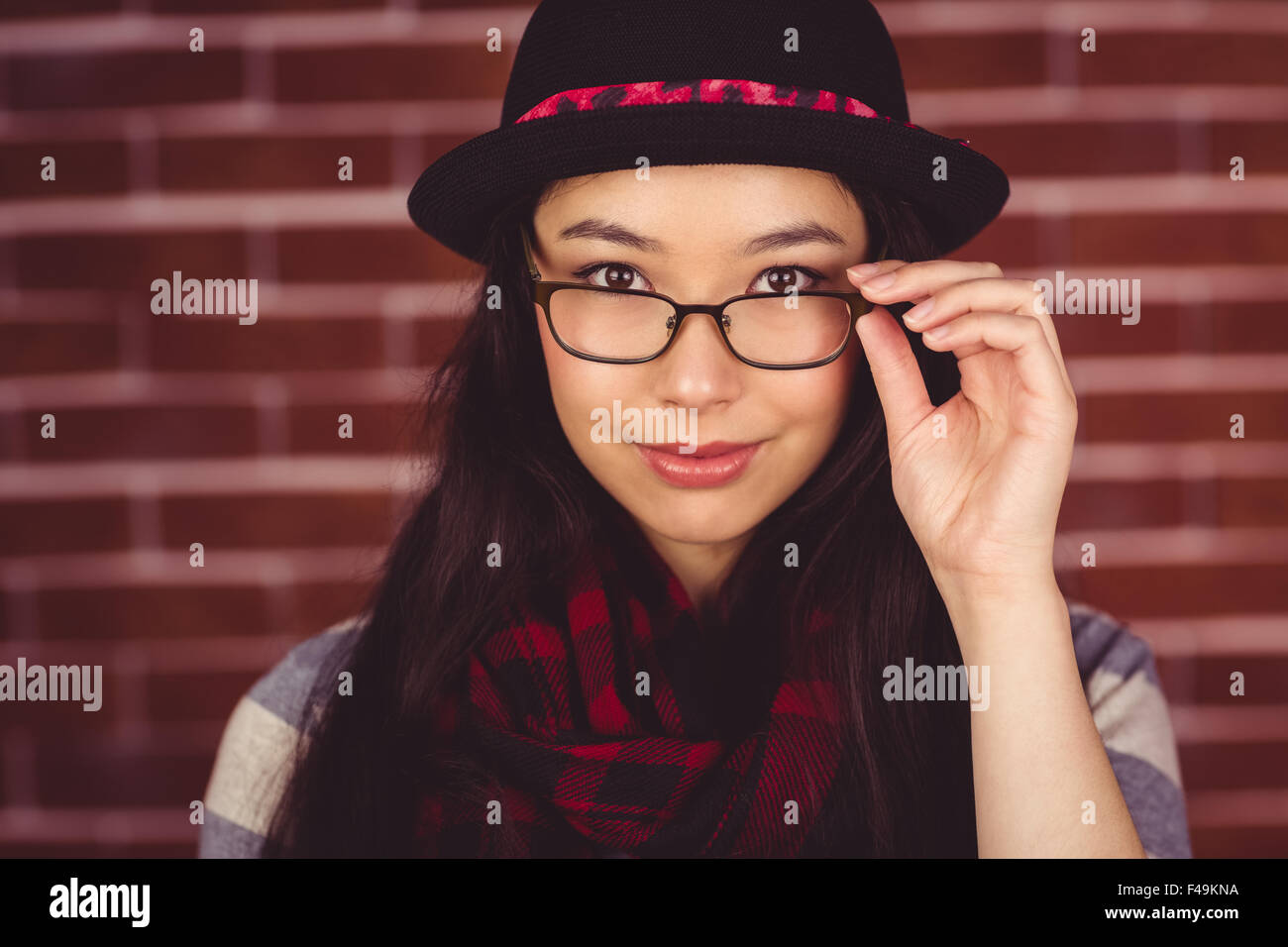 Attractive hipster posing with glasses Stock Photo