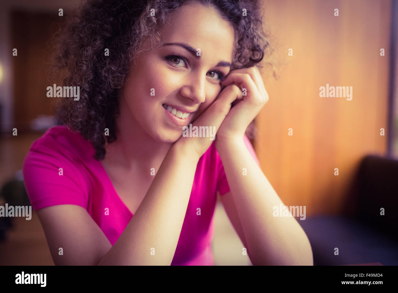 Pretty student smiling at camera Stock Photo - Alamy