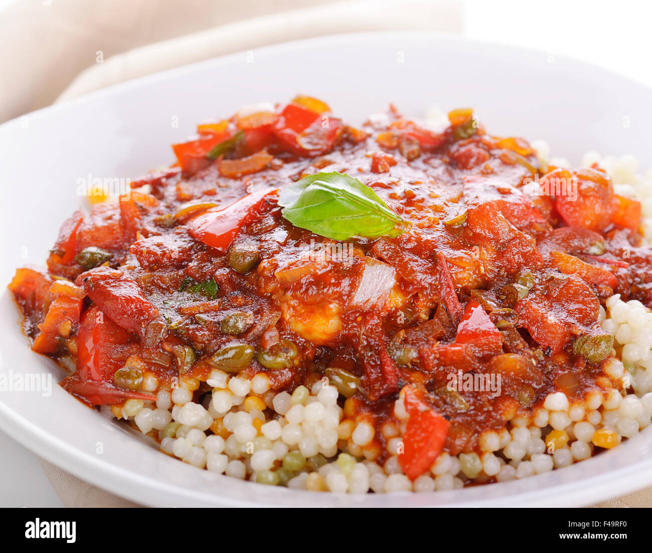 Chicken Cacciatore with Pearl Couscous Stock Photo