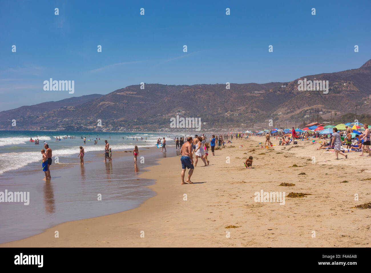 ZUMA BEACH, CALIFORNIA, USA - People on Zuma beach, public beach