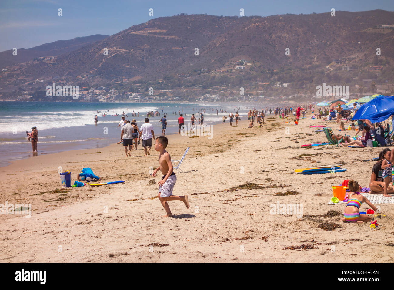 ZUMA BEACH, CALIFORNIA, USA - People on Zuma beach, public beach