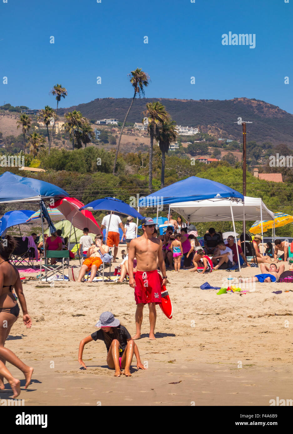 ZUMA BEACH, CALIFORNIA, USA - People on Zuma beach, public beach