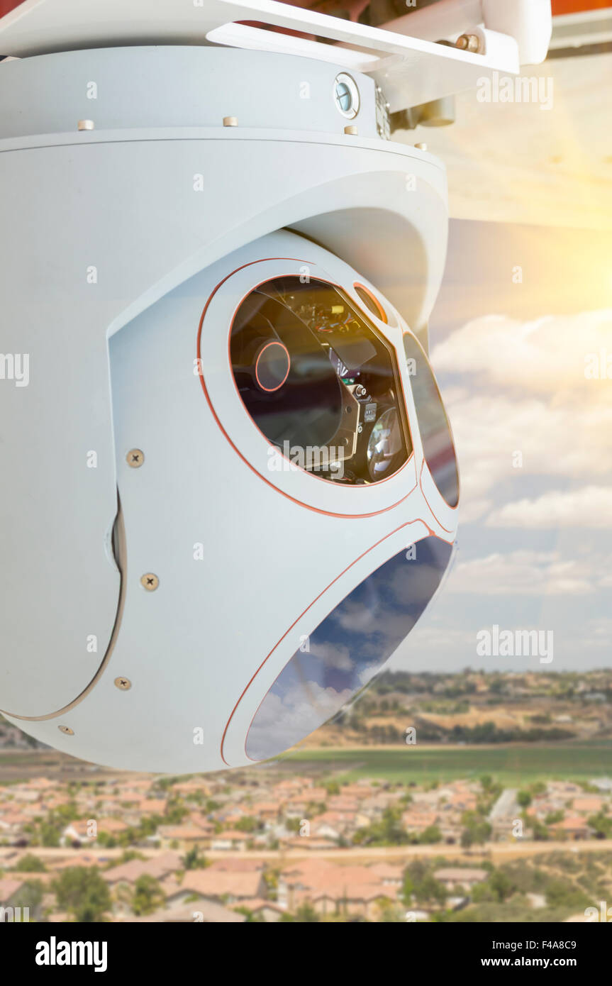 Closeup of A Drone Wing Camera and Sensor Pod Module Above A Residential Neighborhood Stock