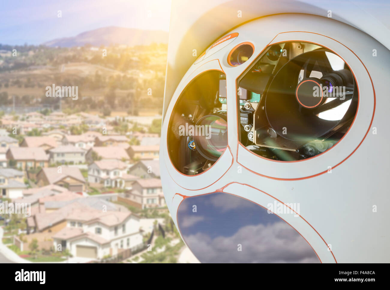 Closeup of A Drone Wing Camera and Sensor Pod Module Above A Residential Neighborhood Stock