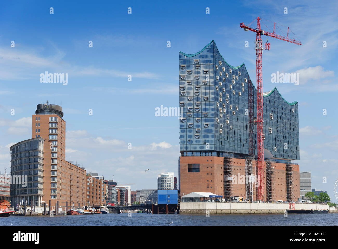 Hamburg, Germany - riverside, new Opera House under construction in mid ...