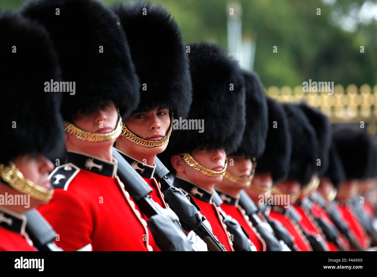 London, UK. 8th Sep, 2015. File photo shows British Royal Guards attending the changing ceremony at the Buckingham Palace in London Sept. 8, 2015. The changing ceremony of the British Royal Guards is held at noon at the Buckingham Palace every day from May to July and evey other day in other months. © Han Yan/Xinhua/Alamy Live News Stock Photo