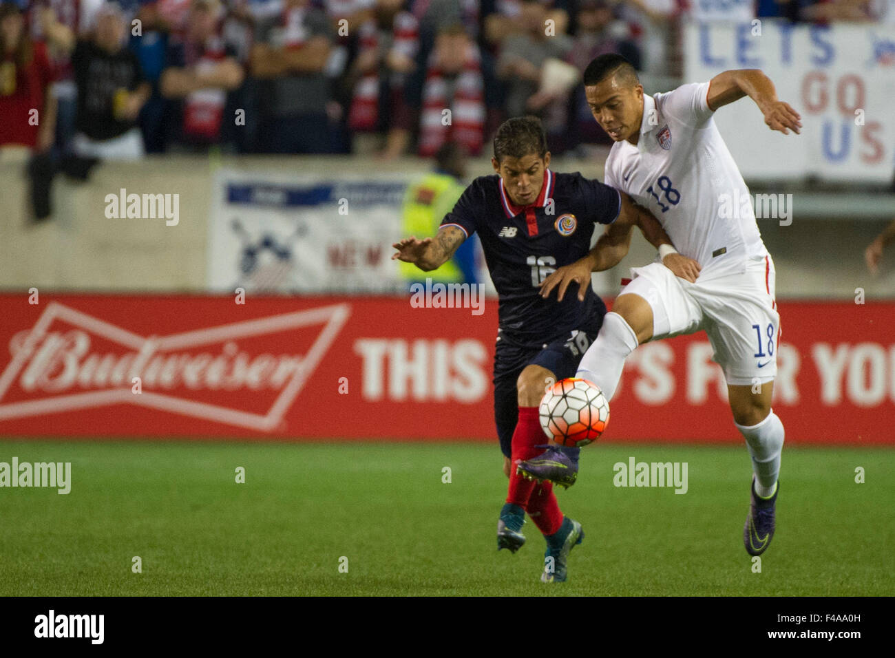 October 13, 2015: USA forward Bobby Wood (18) plays the ball along with Costa Rica defender Christian Gamboa (16) USA Men's National Team vs. Costa Rica Men's National Team- international friendly at Red Bull Arena - Harrison, NJ. Costa Rica defeated The US Men's National Team 1-0. Mandatory Credit: Kostas Lymperopoulos/Cal Sport Media Stock Photo