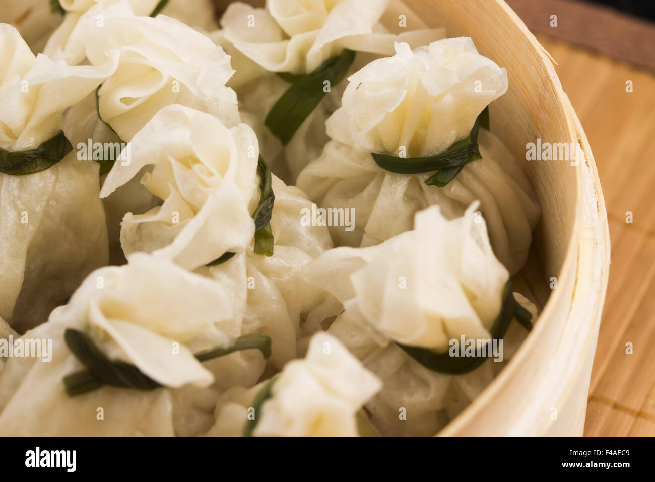 Chinese dumplings in bamboo steamers Stock Photo Alamy