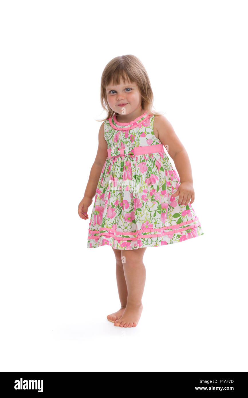 Charming little girl in a dress Stock Photo - Alamy
