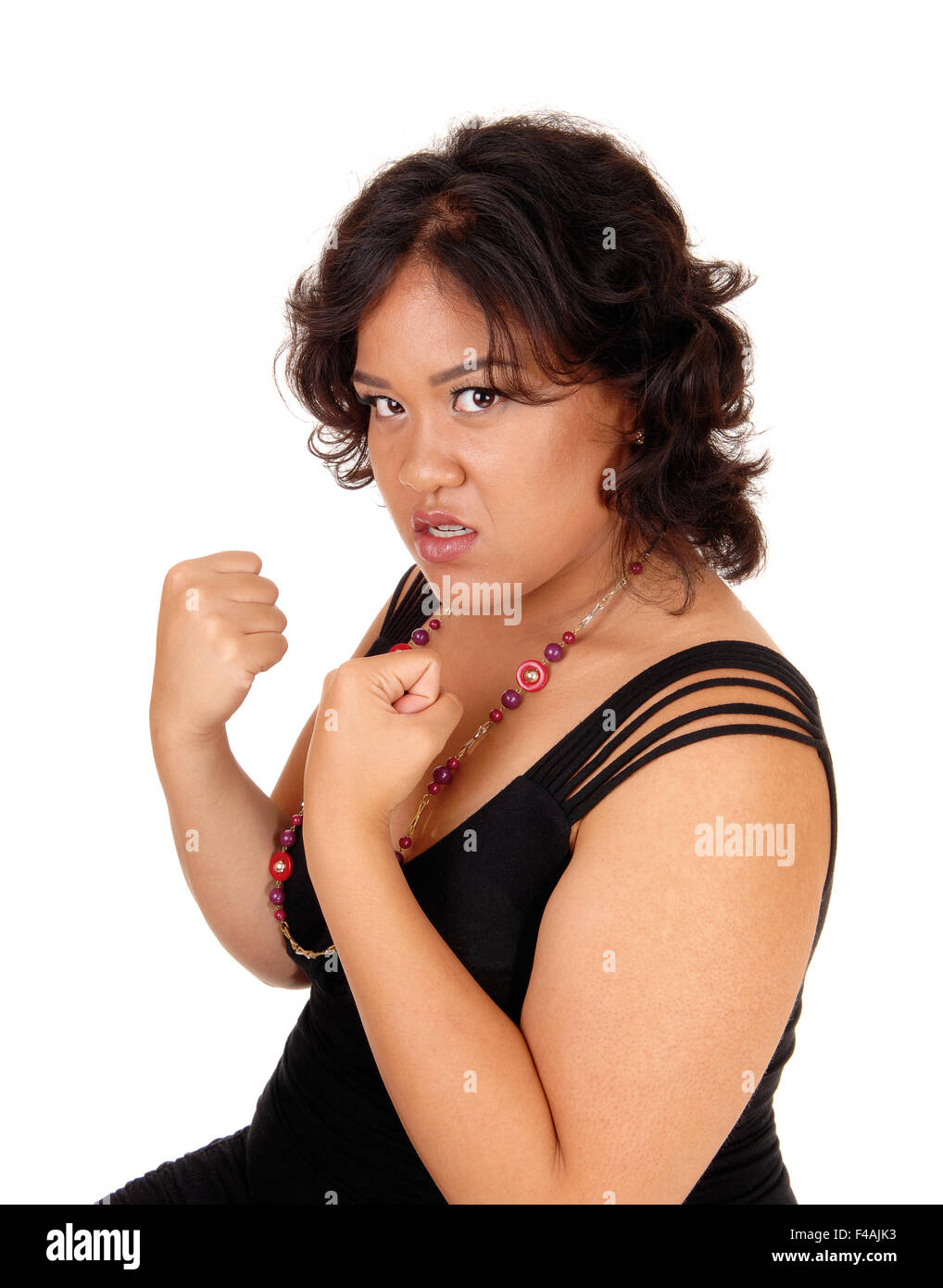 Angry woman ready for fist fight. Stock Photo