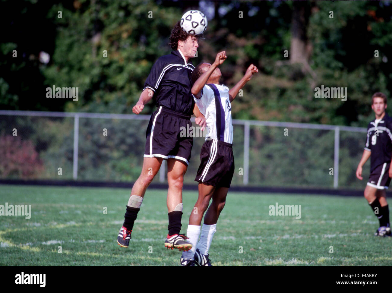 Soccer players in high school soccer game Stock Photo Alamy