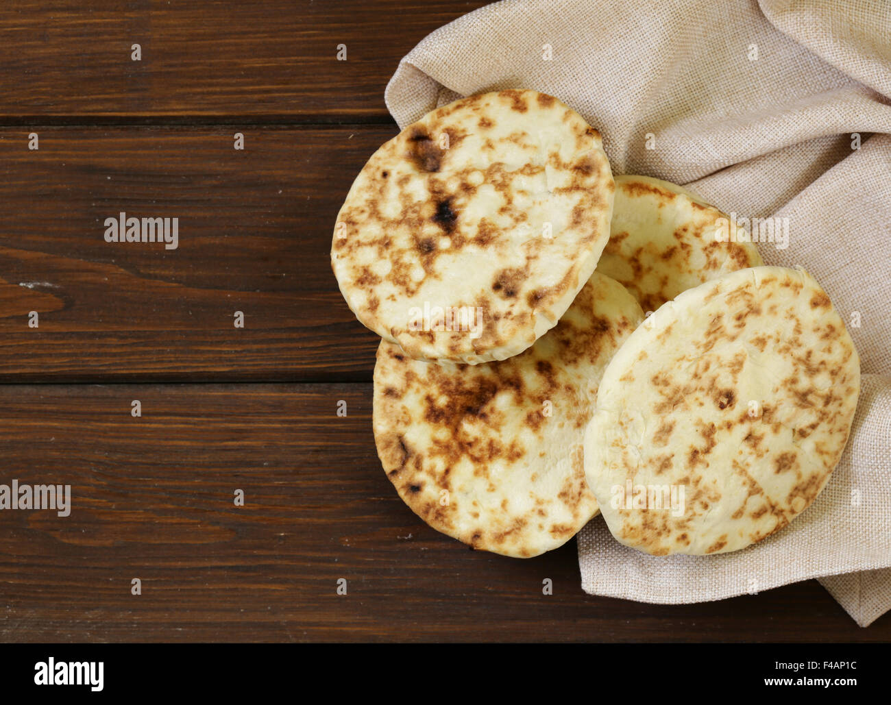 stack of homemade tortillas pita on a wooden table Stock Photo