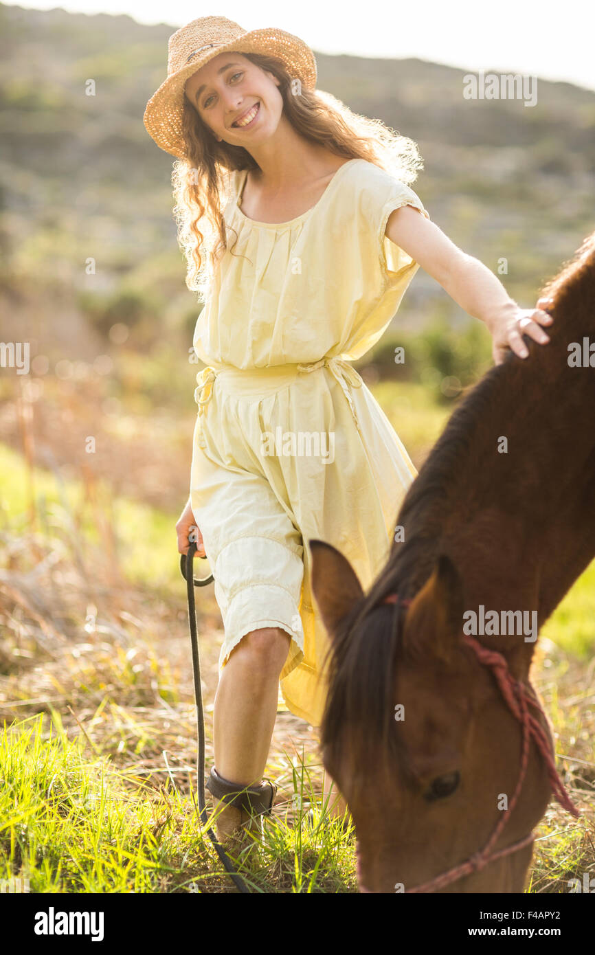 Happy young woman relaxing outdoors hi-res stock photography and images ...
