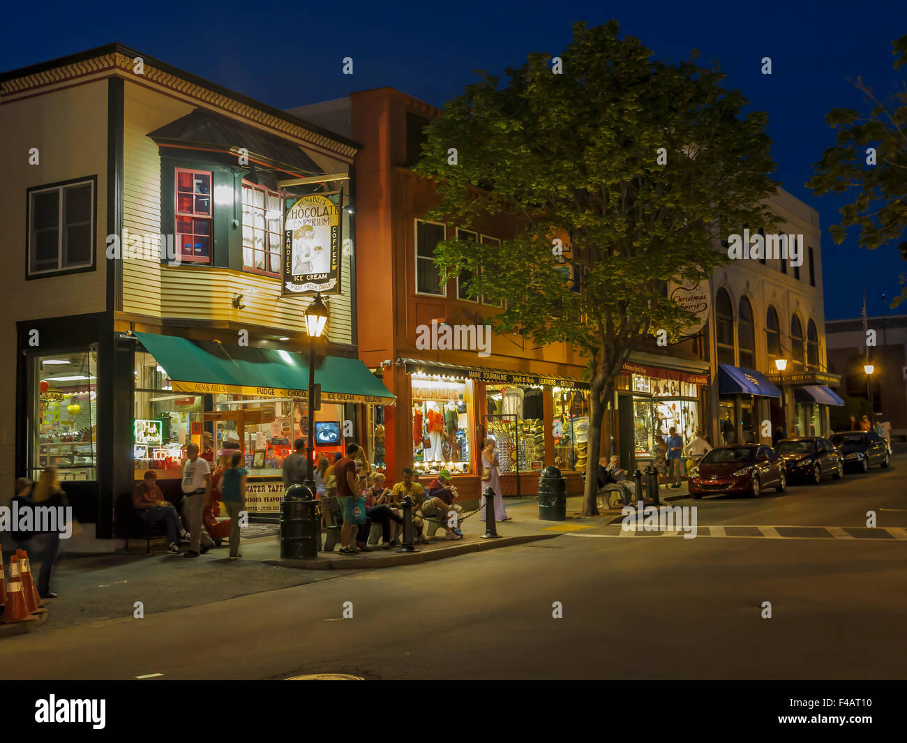 Colourful Main Street at dusk in Bar Harbor Maine USA Stock Photo