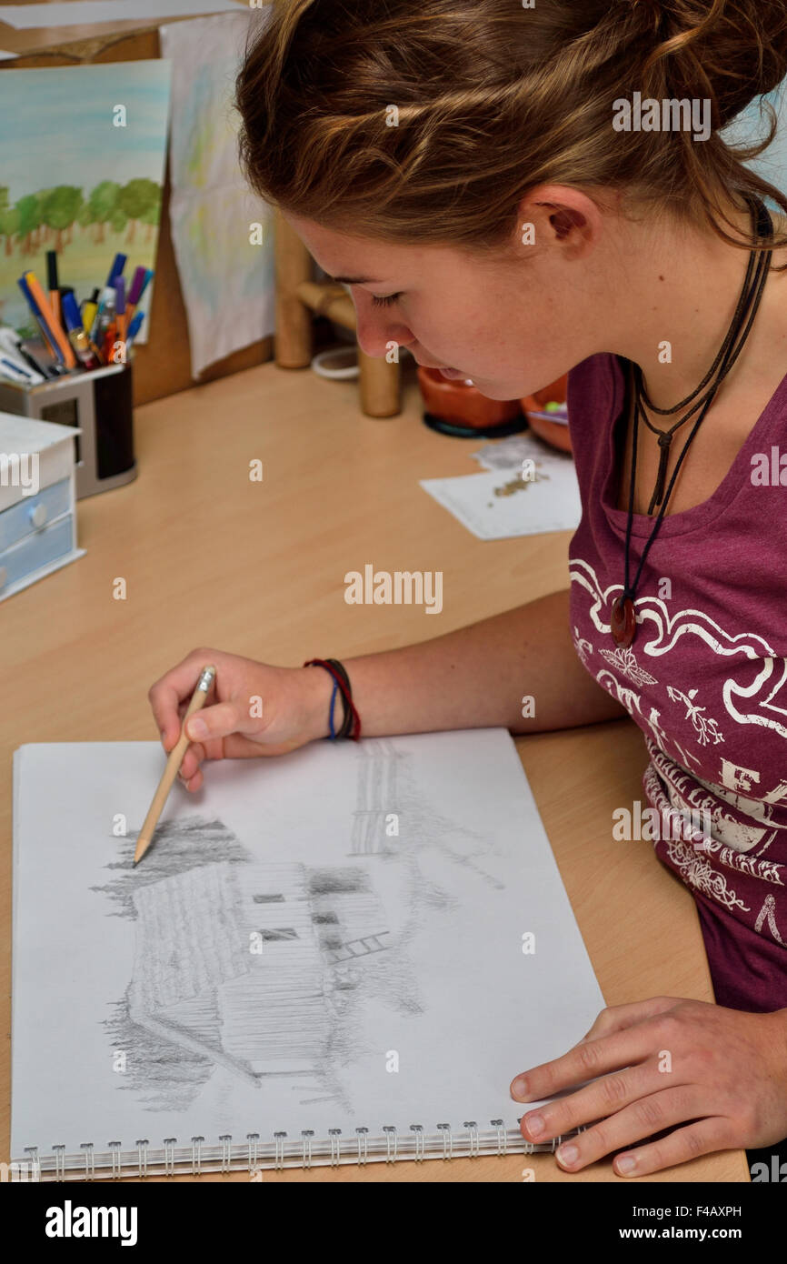 Artist in pencil drawing Stock Photo Alamy