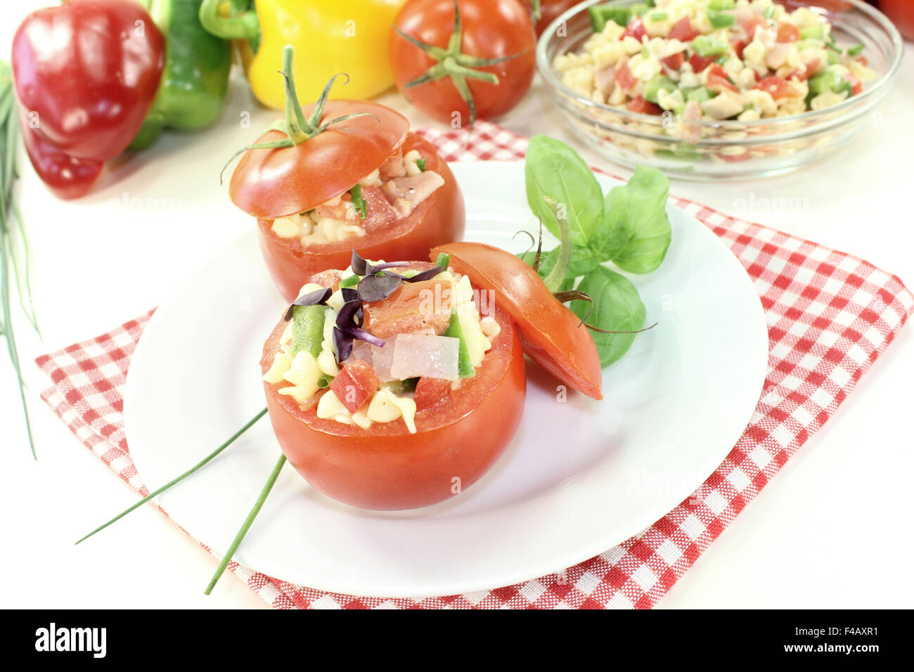 stuffed tomatoes with pasta salad Stock Photo