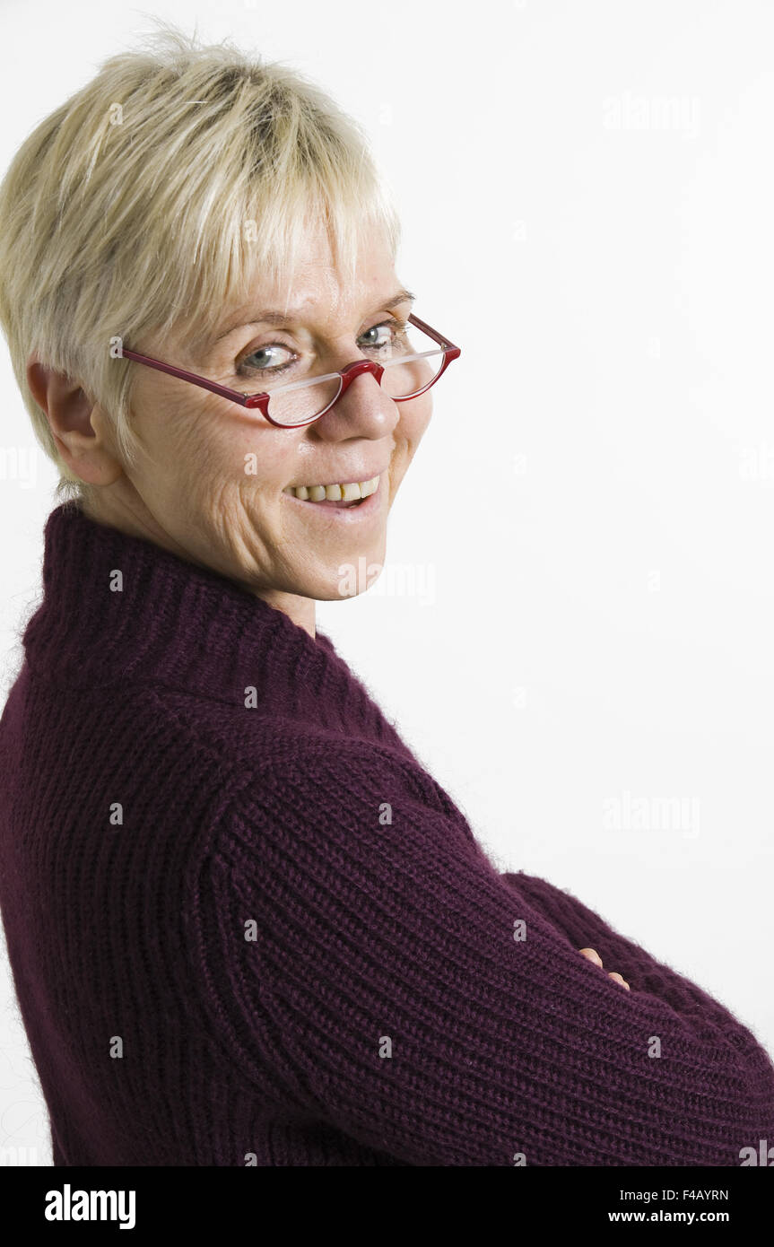 mature woman looking back Stock Photo