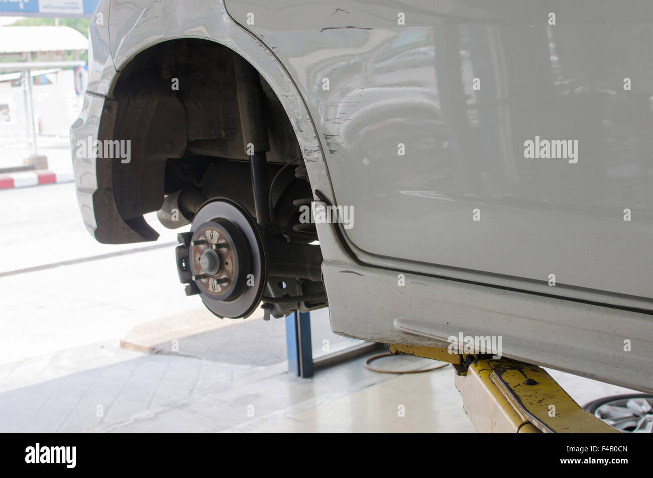 Inside a garage changing wheels/tires Stock Photo Alamy