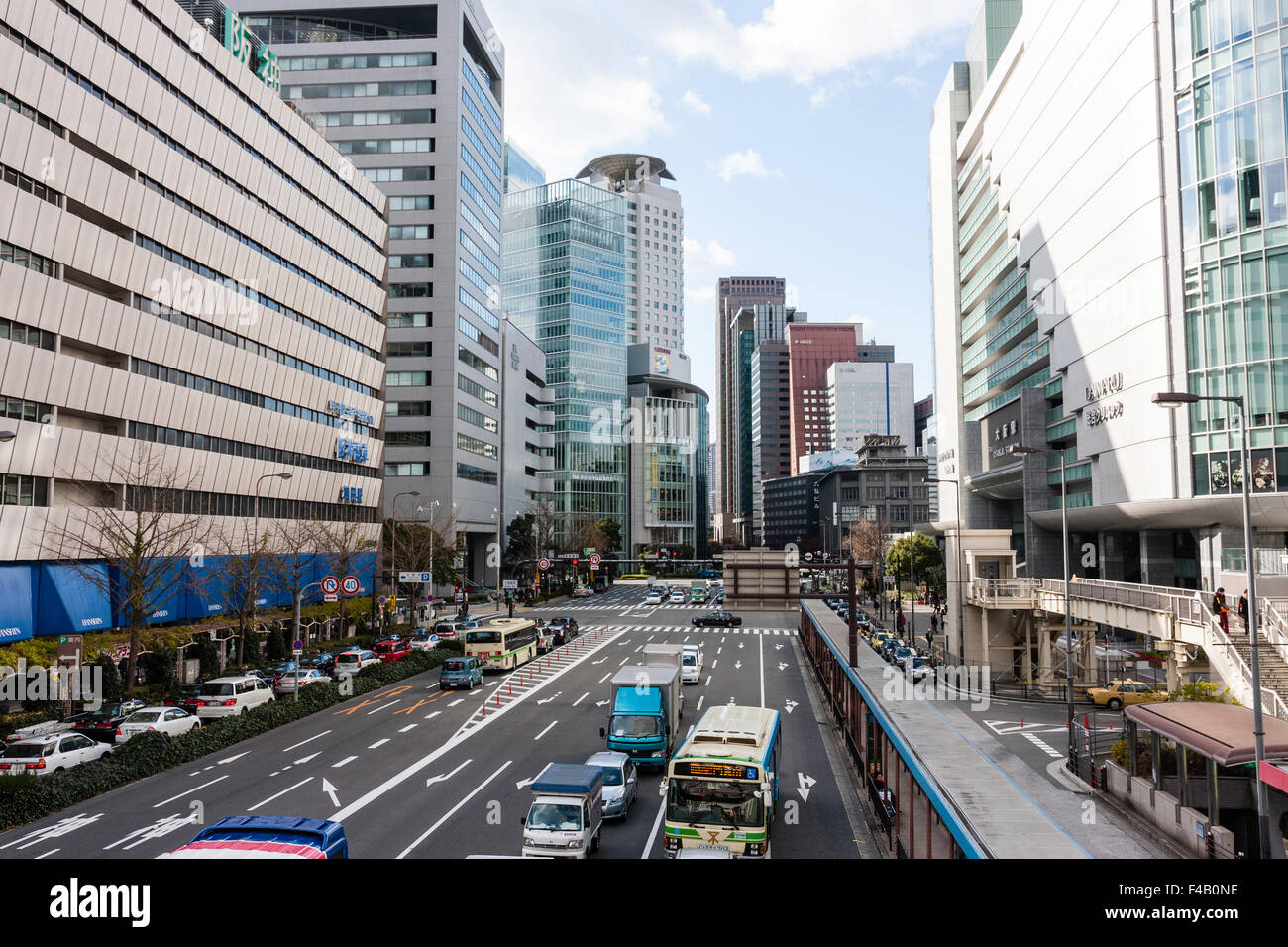Station Road Street View Japan, Osaka, Umeda, City Street View Along Eight Lane Road With Bus Station  And Stops By Daimaru Department Store And Osaka Railway Station Stock Photo  - Alamy