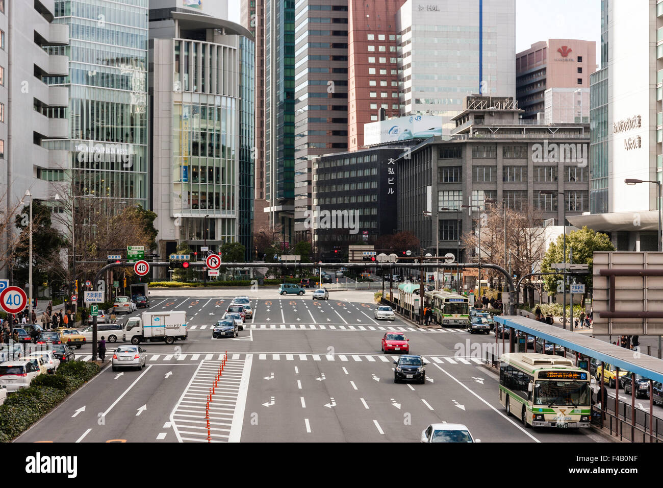 Station Road Street View Japan, Osaka, Umeda, City Street View Along Eight Lane Road With Bus Station  And Stops By Daimaru Department Store And Osaka Railway Station Stock Photo  - Alamy